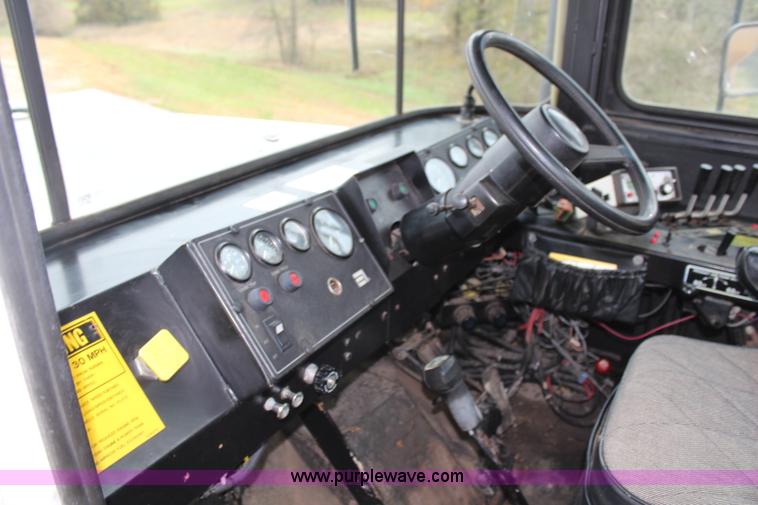 image for item H7961 1992 Ag-Chem TerraGator 1603T dry fertilizer spreader truck