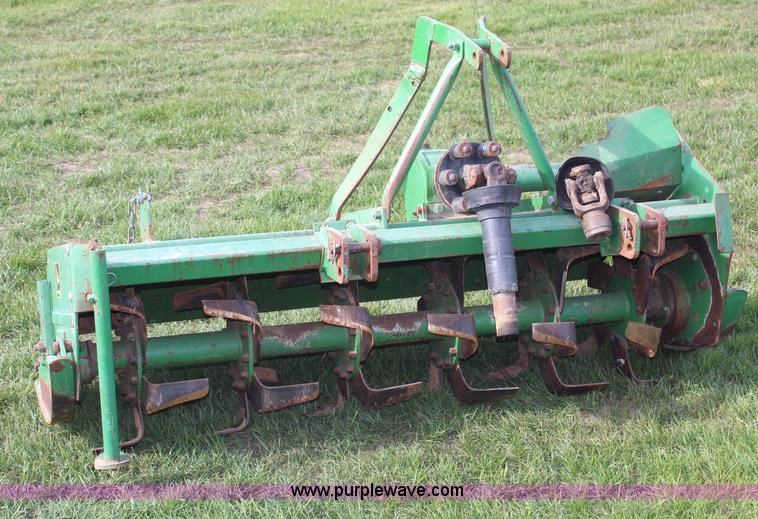 image for item H7968 John Deere 660 tiller