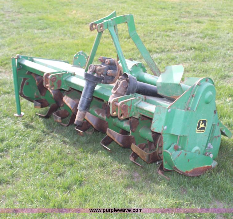 image for item H7968 John Deere 660 tiller