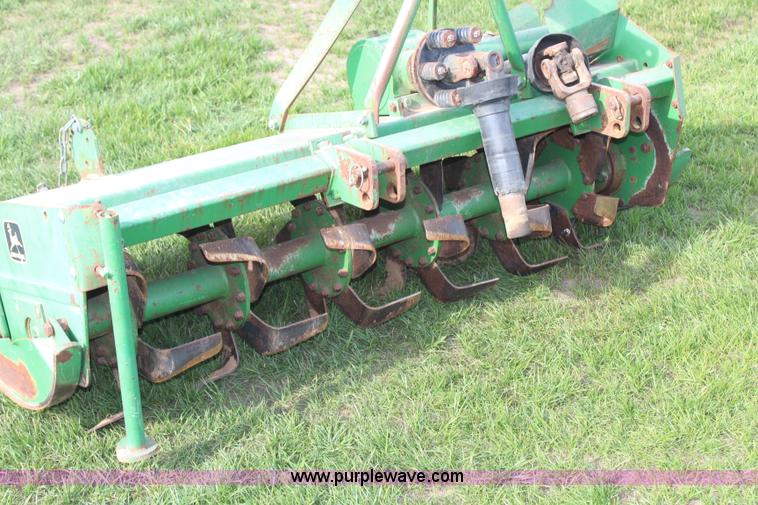 image for item H7968 John Deere 660 tiller