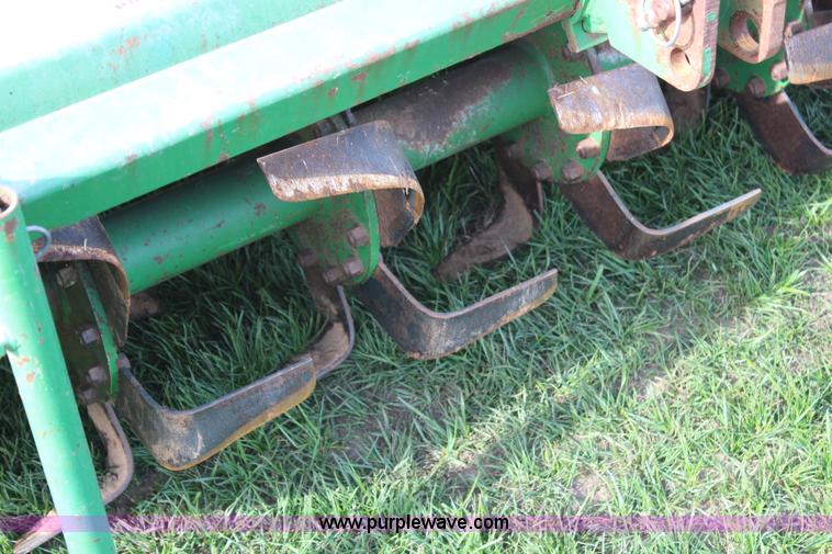 image for item H7968 John Deere 660 tiller