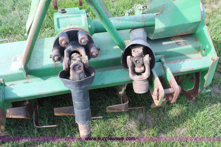 image for item H7968 John Deere 660 tiller