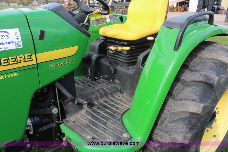 image for item H7971 2002 John Deere 4610 MFWD tractor