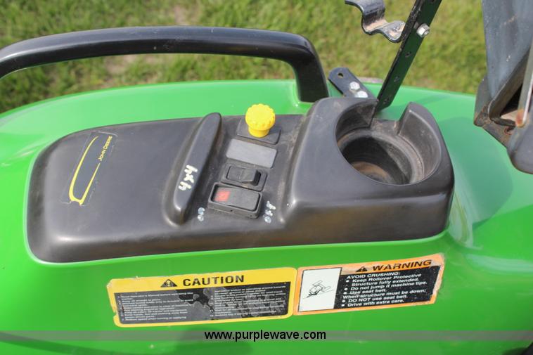 image for item H7971 2002 John Deere 4610 MFWD tractor