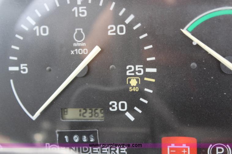 image for item H7971 2002 John Deere 4610 MFWD tractor