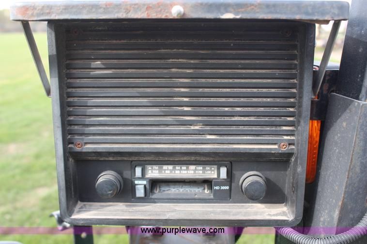 image for item H7971 2002 John Deere 4610 MFWD tractor