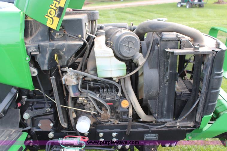 image for item H7971 2002 John Deere 4610 MFWD tractor