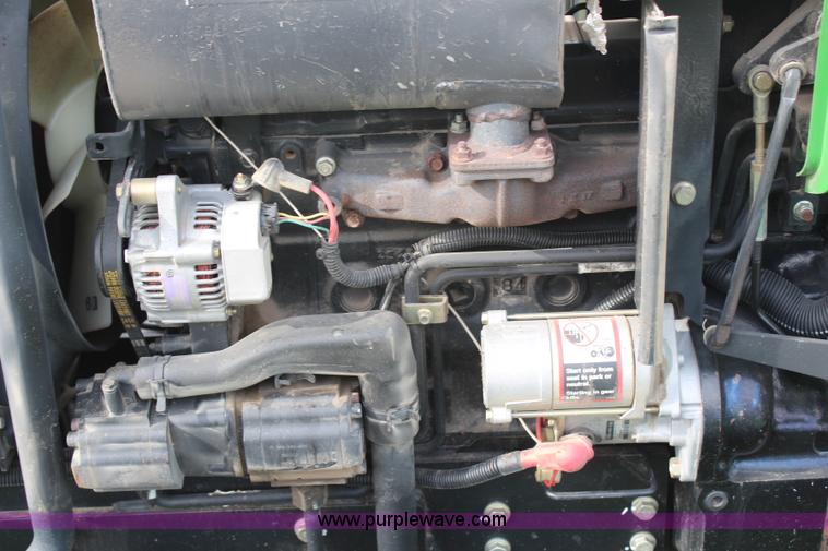 image for item H7971 2002 John Deere 4610 MFWD tractor