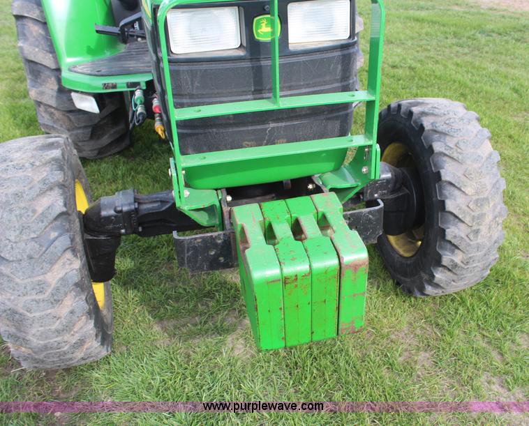 image for item H7971 2002 John Deere 4610 MFWD tractor