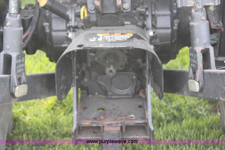 image for item H7971 2002 John Deere 4610 MFWD tractor