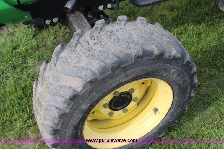 image for item H7971 2002 John Deere 4610 MFWD tractor