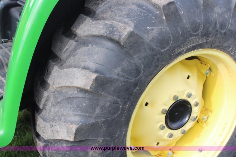 image for item H7971 2002 John Deere 4610 MFWD tractor