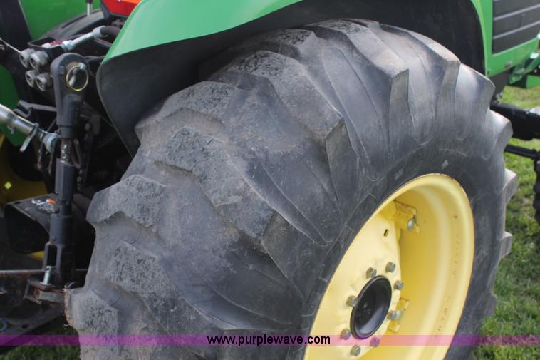 image for item H7971 2002 John Deere 4610 MFWD tractor