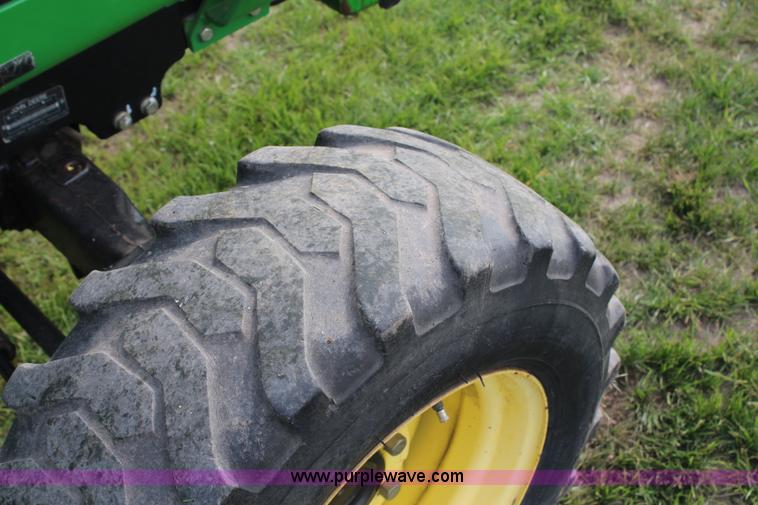 image for item H7971 2002 John Deere 4610 MFWD tractor