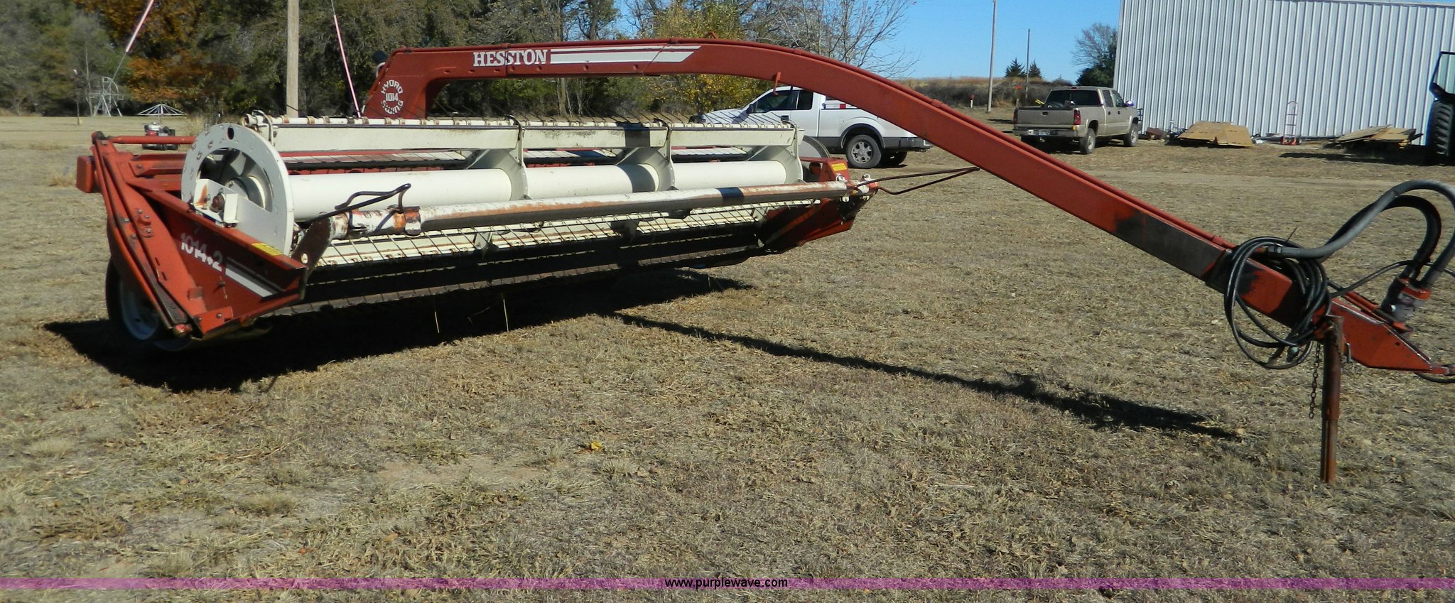Hesston 1014 hydroswing swather in Ellinwood, KS | Item AZ9029 sold