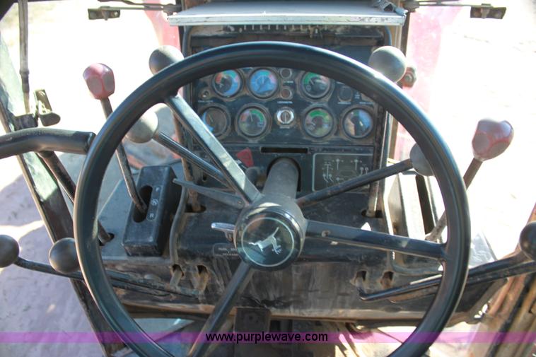 image for item H7308 1983 John Deere 670A articulating motor grader