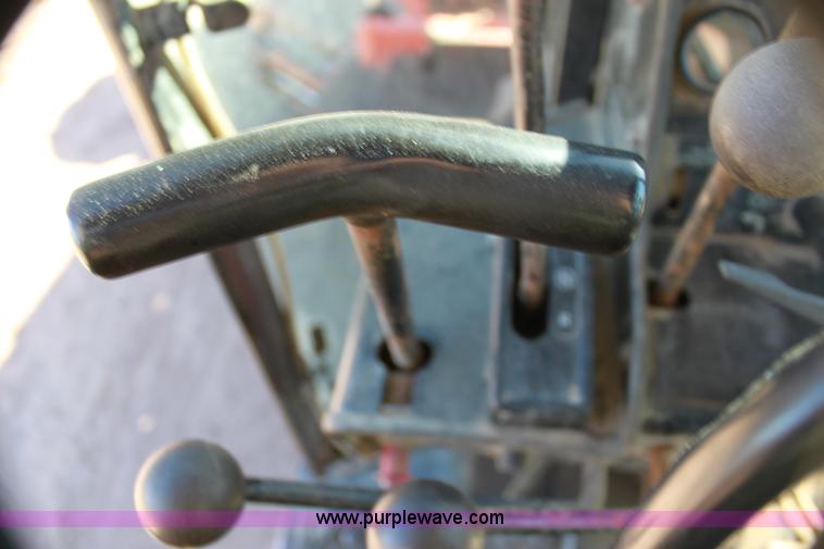 image for item H7308 1983 John Deere 670A articulating motor grader