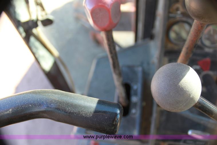 image for item H7308 1983 John Deere 670A articulating motor grader