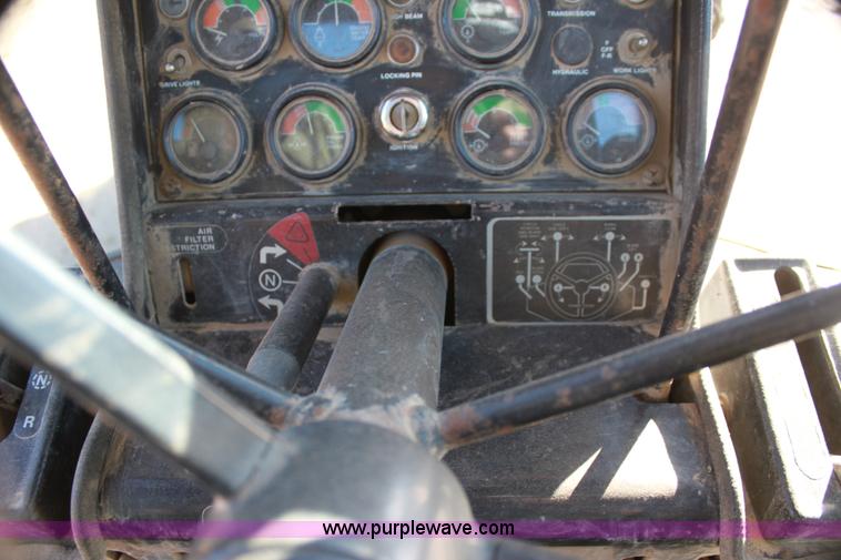 image for item H7308 1983 John Deere 670A articulating motor grader