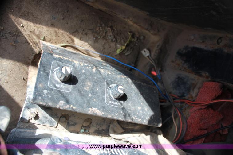 image for item H7308 1983 John Deere 670A articulating motor grader