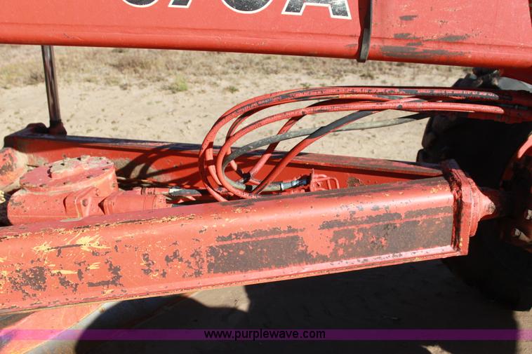 image for item H7308 1983 John Deere 670A articulating motor grader