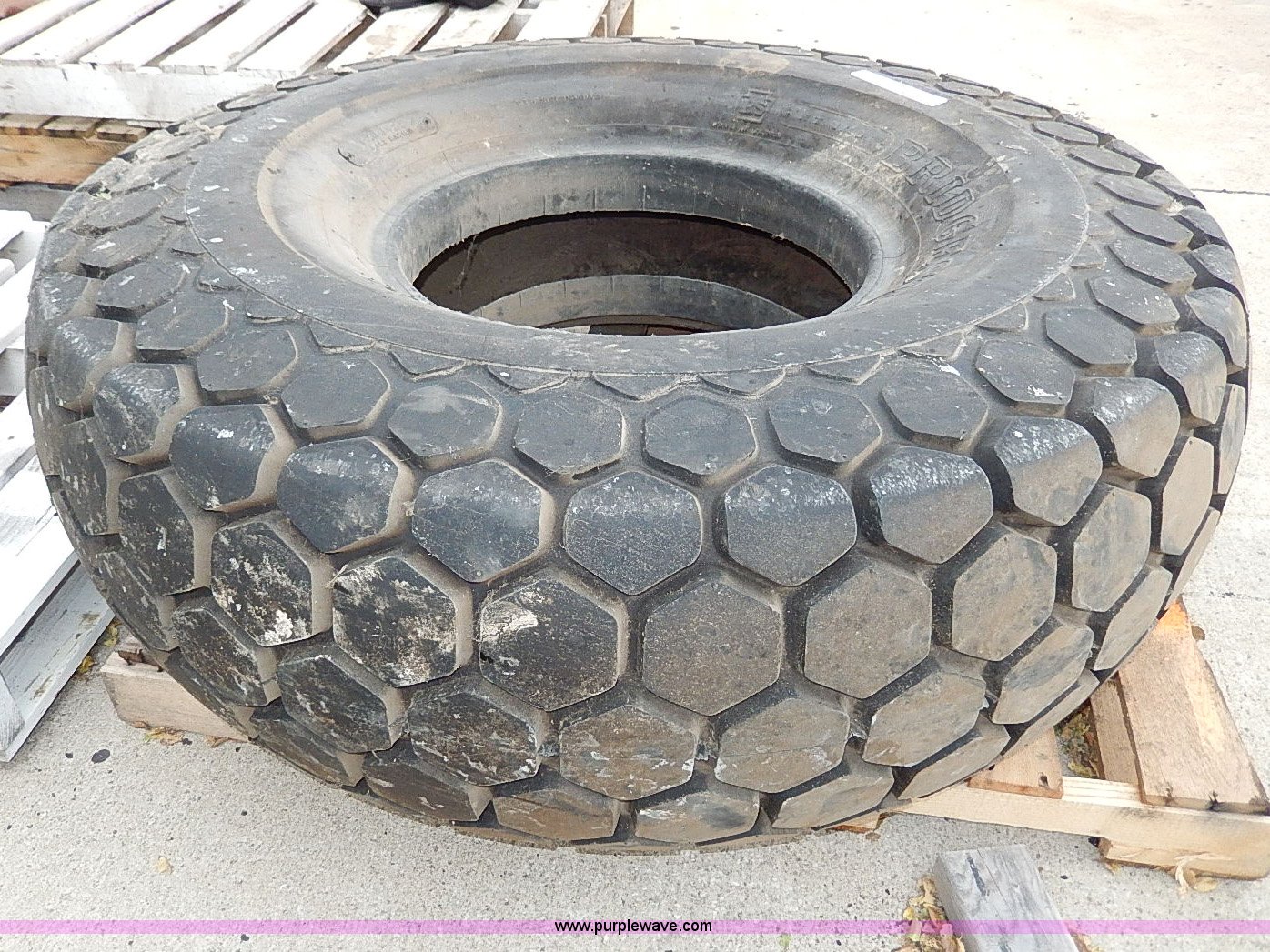Bridgestone 16.0021 tire in St. Joseph, MO Item AP9923 sold Purple