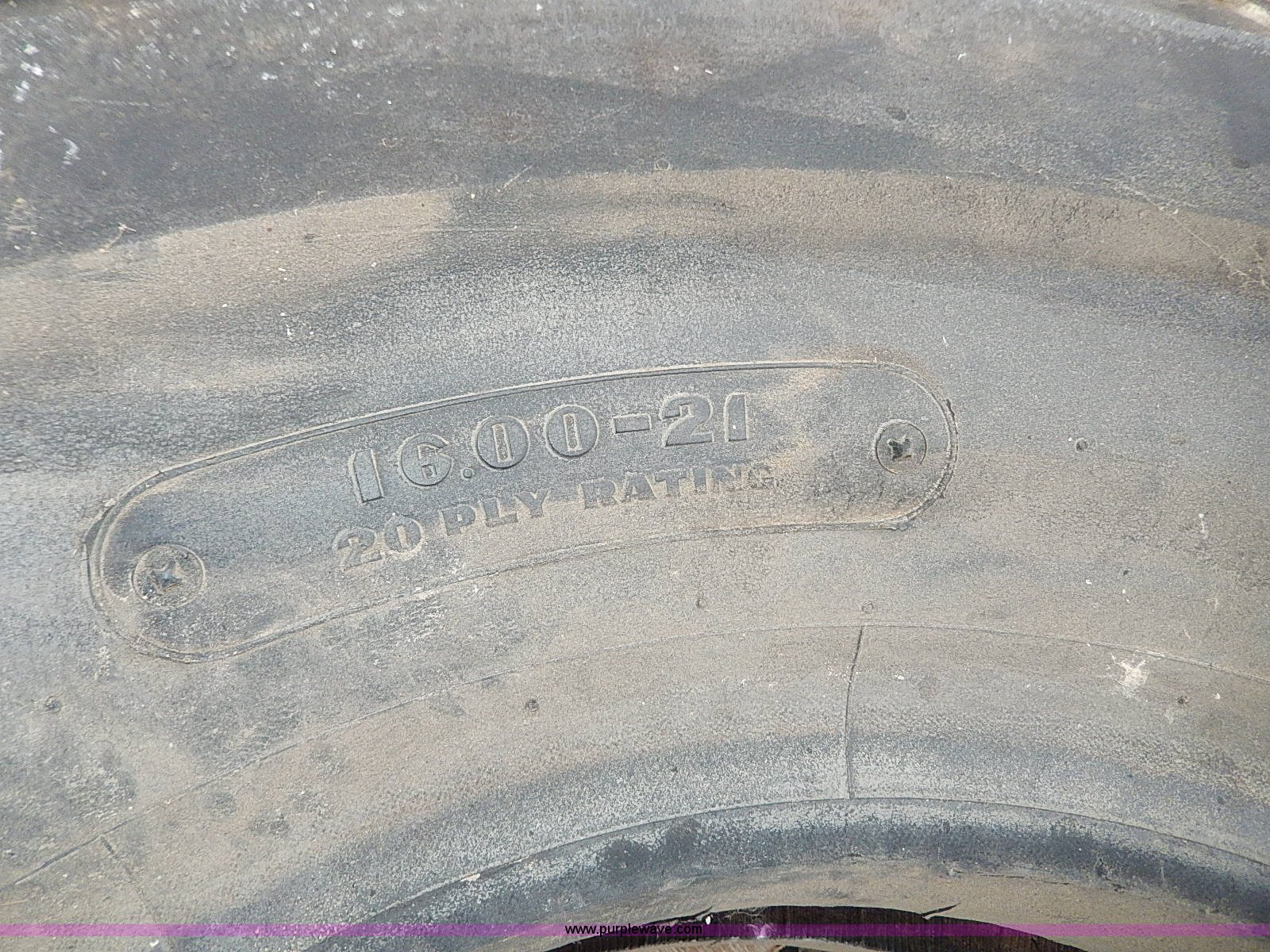 Bridgestone 16.0021 tire in St. Joseph, MO Item AP9923 sold Purple