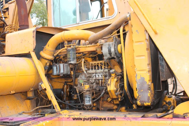 image for item H4190 1978 John Deere 762 elevating paddle scraper