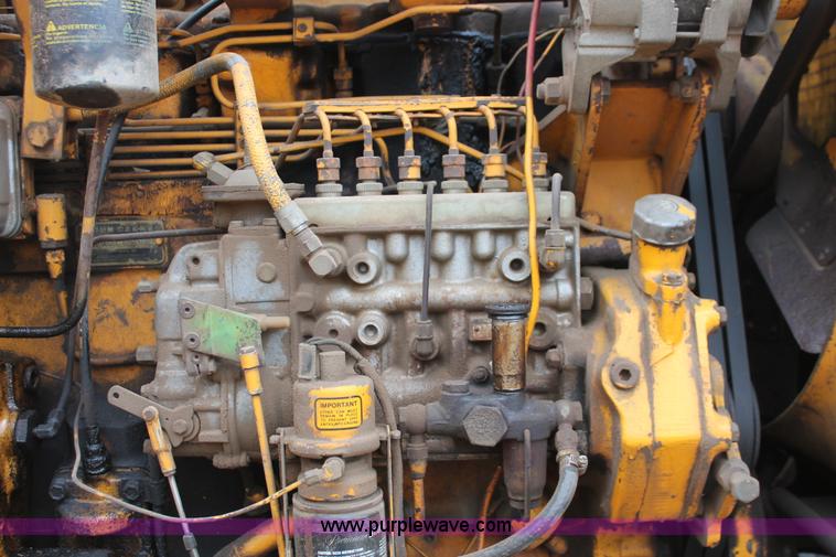 image for item H4190 1978 John Deere 762 elevating paddle scraper