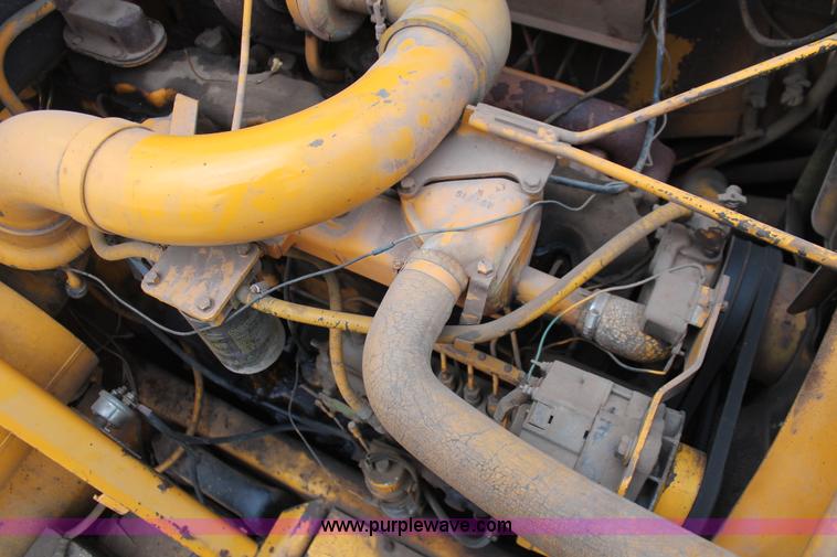 image for item H4190 1978 John Deere 762 elevating paddle scraper