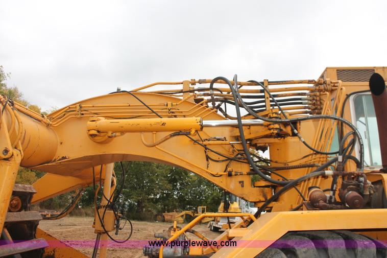 image for item H4190 1978 John Deere 762 elevating paddle scraper