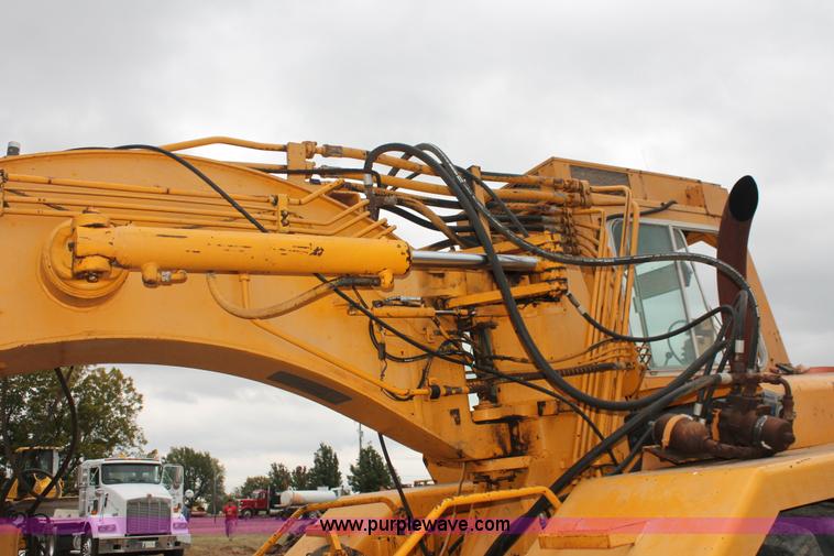 image for item H4190 1978 John Deere 762 elevating paddle scraper