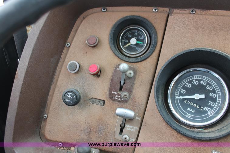 image for item H4200 1978 Ford W911 rollback truck