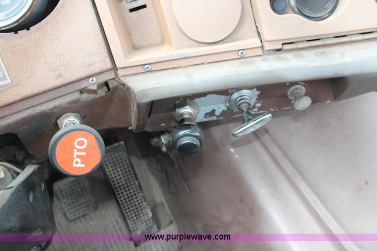 image for item H4200 1978 Ford W911 rollback truck