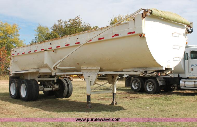 image for item H4210 1985 Fruehauf 30' barrel end dump trailer