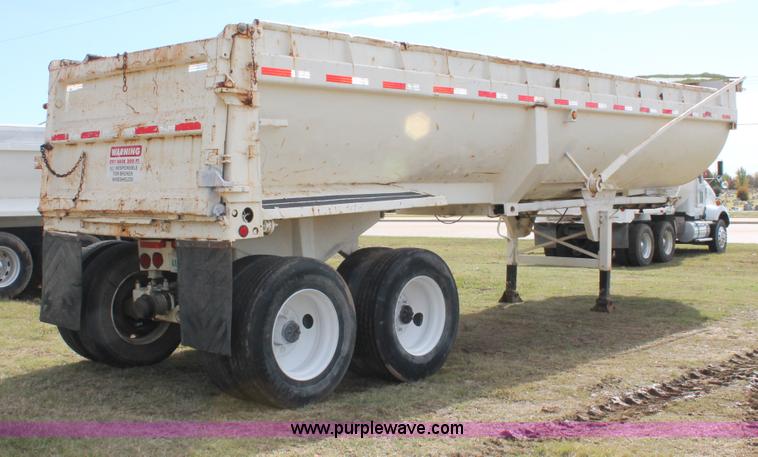 image for item H4210 1985 Fruehauf 30' barrel end dump trailer