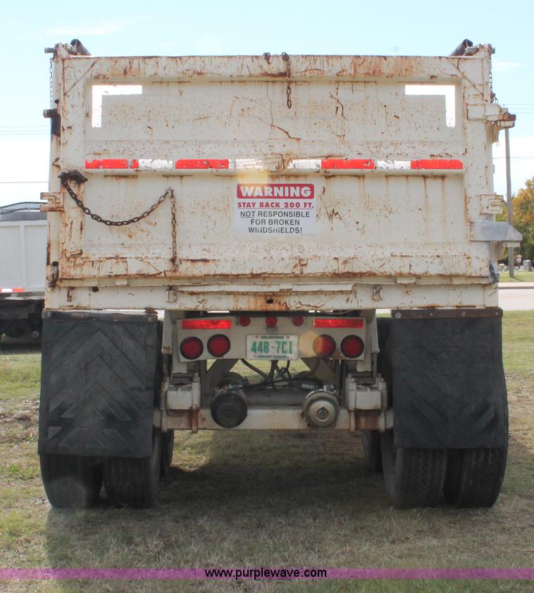 image for item H4210 1985 Fruehauf 30' barrel end dump trailer