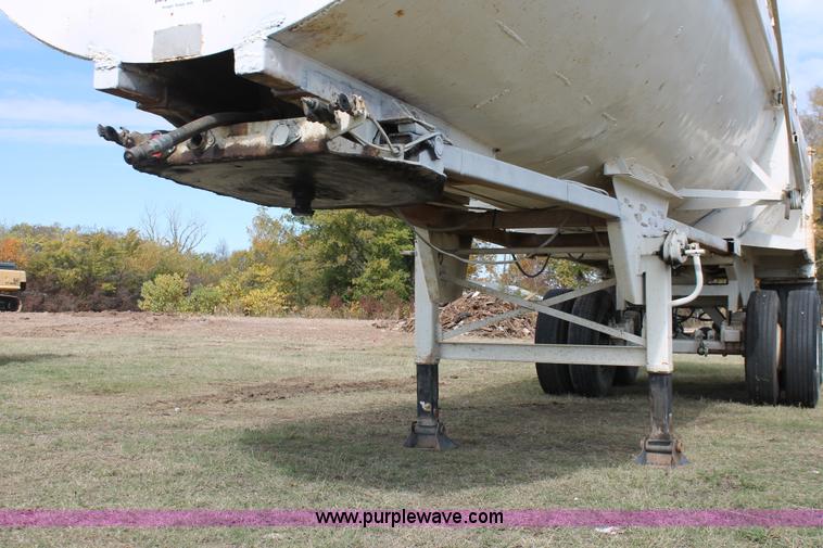 image for item H4210 1985 Fruehauf 30' barrel end dump trailer