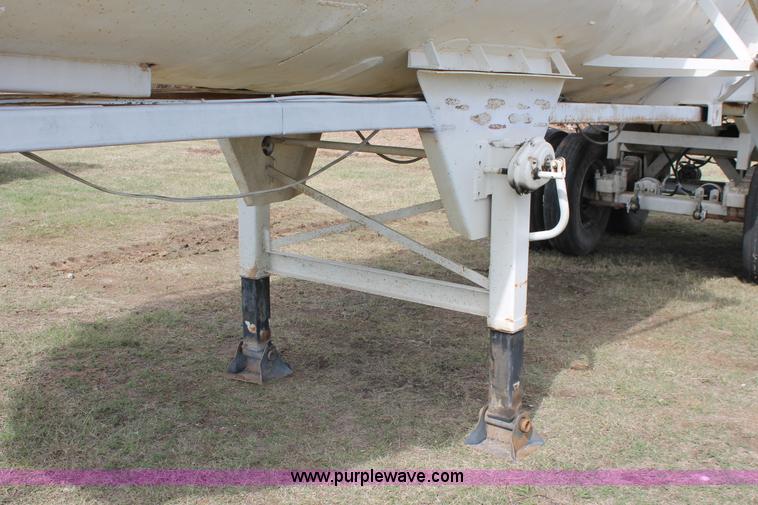 image for item H4210 1985 Fruehauf 30' barrel end dump trailer