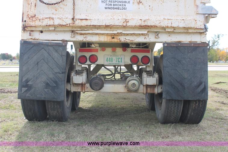 image for item H4210 1985 Fruehauf 30' barrel end dump trailer