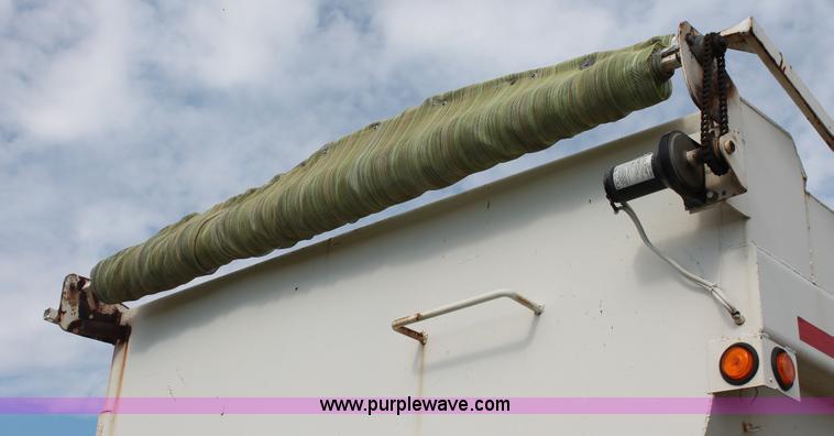 image for item H4210 1985 Fruehauf 30' barrel end dump trailer