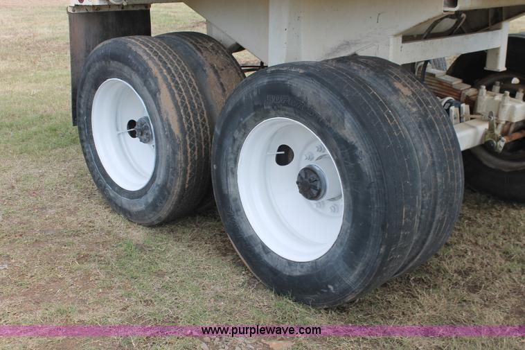 image for item H4210 1985 Fruehauf 30' barrel end dump trailer