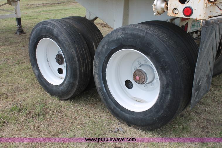 image for item H4210 1985 Fruehauf 30' barrel end dump trailer