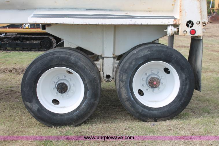 image for item H4210 1985 Fruehauf 30' barrel end dump trailer