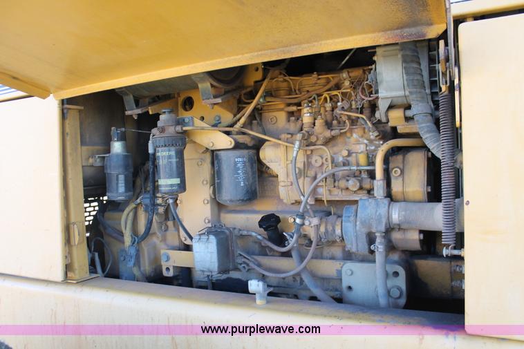 image for item H4211 1995 John Deere 770BH articulated motor grader