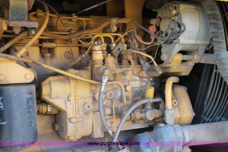 image for item H4211 1995 John Deere 770BH articulated motor grader