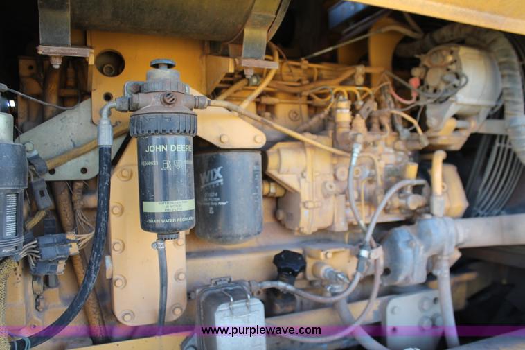 image for item H4211 1995 John Deere 770BH articulated motor grader