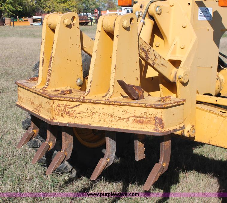 image for item H4211 1995 John Deere 770BH articulated motor grader