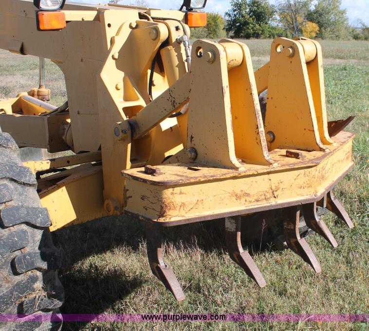 image for item H4211 1995 John Deere 770BH articulated motor grader