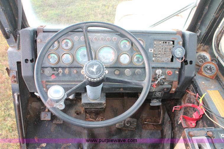 image for item H4214 1981 John Deere 862 elevating paddle scraper